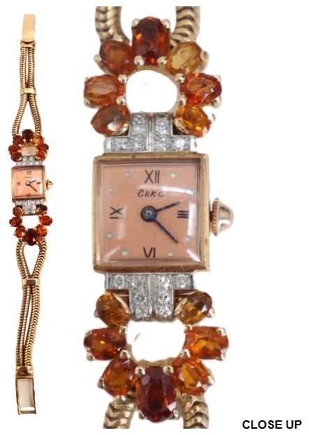 1940s Swiss Eska 18k Gold and Tourmaline and Diamond Bracelet Wrist Watch - Gross 34.9 g: 1940s Swiss Eska 18k Gold and Tourmaline and Diamond Bracelet Wrist Watch - Gross 34.9 g. A stunning piece with heavy Art Deco influence, a square rosy pink face with 3, 6, 9, and 12 in Roman numerals