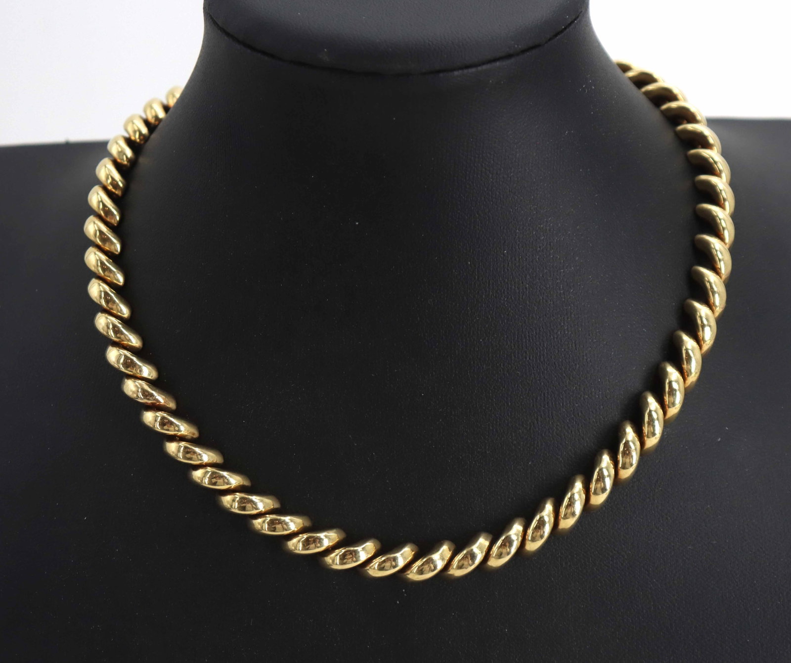 Italian 14k Yellow Gold Necklace - 38.5 g.: Italian 14k Yellow Gold Necklace - 38.5 g. 14k gold collar necklace displayed on a black bust, featuring a thick, continuous twisted-rope design with a smooth, high-shine finish. Marked