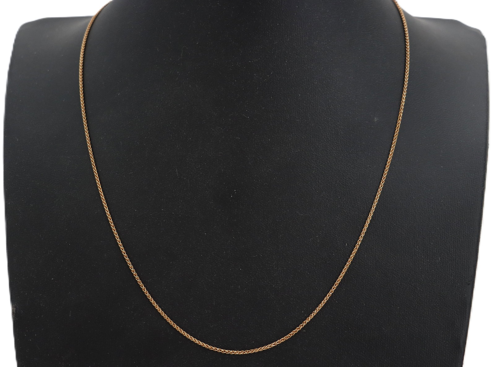 Marked Italian 750 (18k) Gold Chain - 3.6 g.: Marked Italian 750 (18k) Gold Chain. Marked near clasp. Yellow gold. Features a classic wheat (spiga) link design. Lobster claw clasp. Length: 19 in. Weight: 2.3 dwt. 3.6 g. 