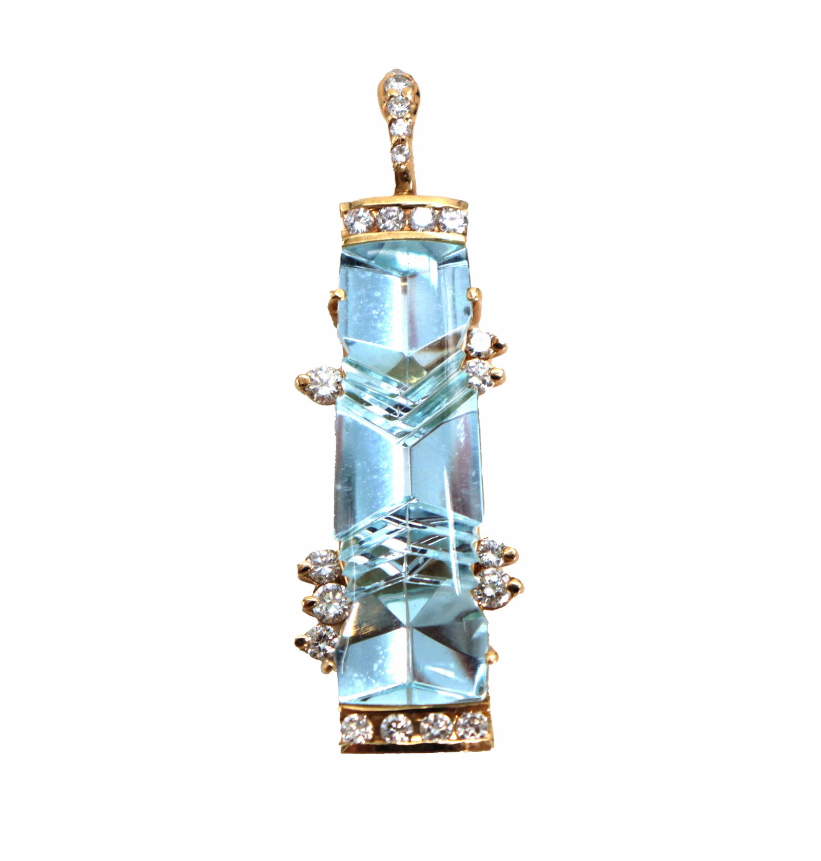 14k Gold, Aquamarine, and Diamond Pendant - Gross 8.8 g.: 14k Gold, Aquamarine, and Diamond Pendant. Several round cut diamonds set in 14k yellow gold. Rectangular cut aquamarine. Marked on bezel. Size: 1/2 x 1 3/4 x 3/4 in. Gross Weight: 5.6 dwt. 8.8 