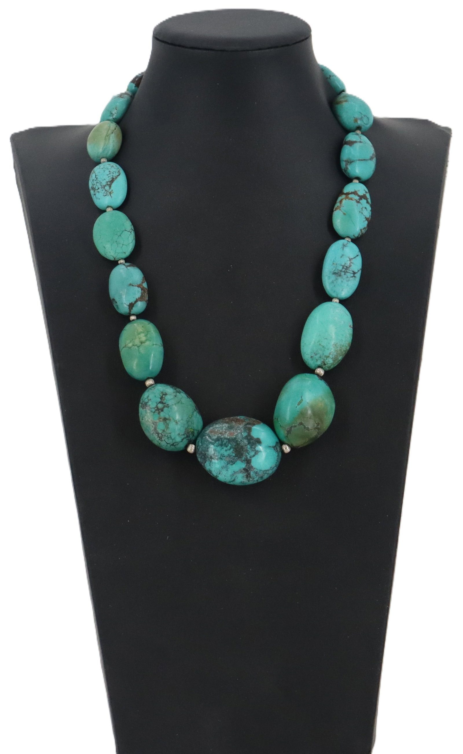 Chunky Turquoise Necklace: Chunky Turquoise Necklace. Absolutely stunning blue color with striations, in nuggets of increasing size from the clasp down to the middle of the piece. Length: 21 in. 