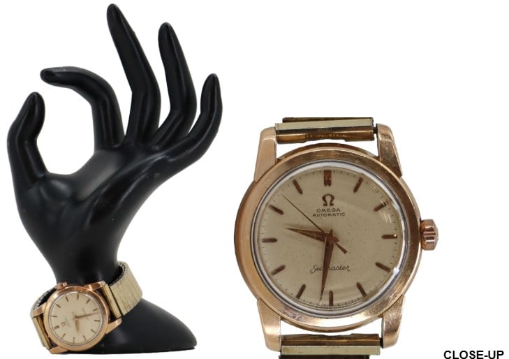 1950s Omega Seamaster Automatic 10k Gold Filled Wrist Watch with Stretch Band: 1950s Omega Seamaster Automatic 10k Gold Filled Wrist Watch with Stretch Band. Arrows instead of numbers on the face for the hours, with noon distinguished by a double arrow. Marked throughout. 
