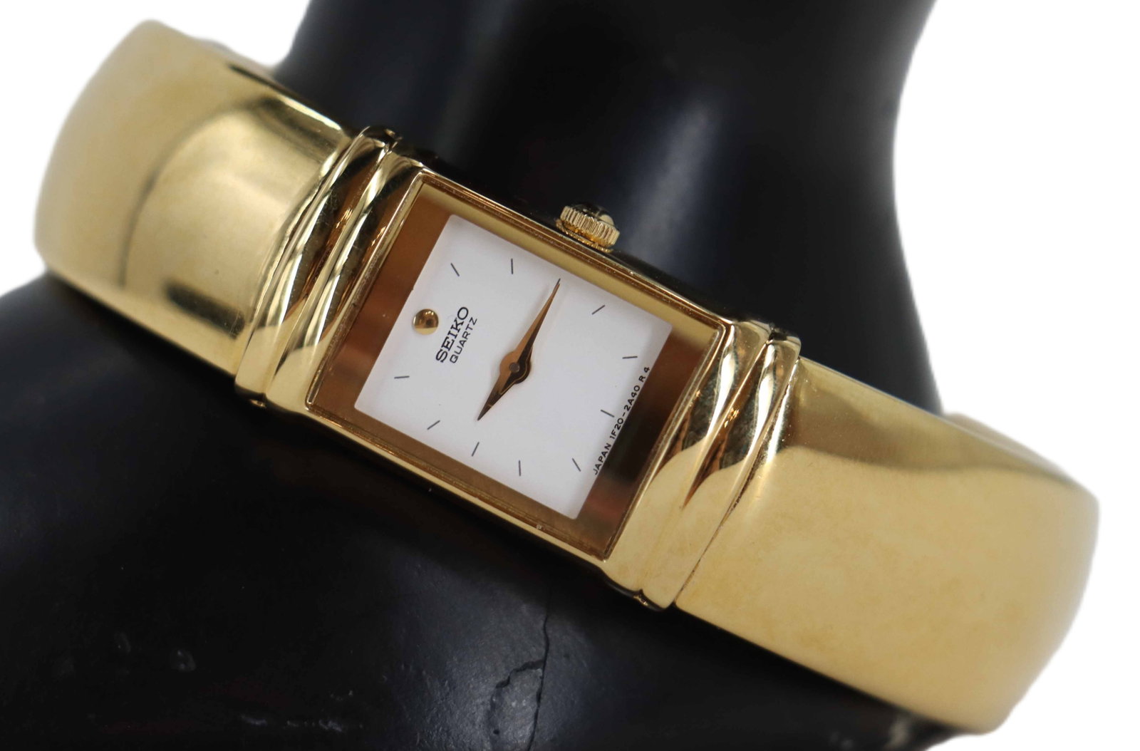 Japanese Seiko Gold Plated Lotus Bangle Women's Wrist Watch: Japanese Seiko Gold Plated Lotus Bangle Women's Wrist Watch. So-called for the shape the watch makes when they bangle is undone, this stunning timepiece has an elegant segmented bangle with rounde