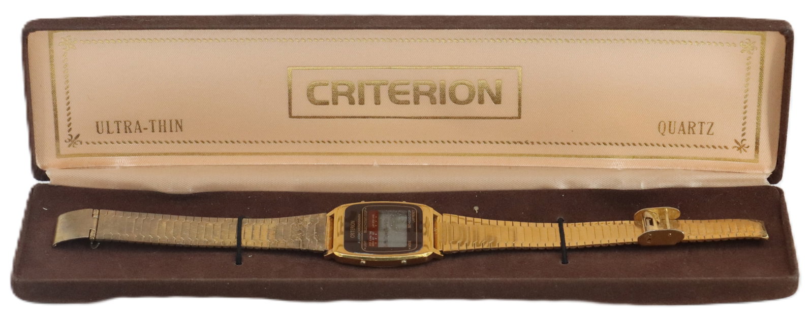 Criterion Quartz Electronic Gold Plated Metal Ultra-Thin Wrist Watch in Original Packaging: Criterion Quartz Electronic Gold Plated Metal Ultra-Thin Wrist Watch in Original Packaging. Digital face with dates at top, stopwatch and alarm features, and a flexible stainless steel band. Made in H