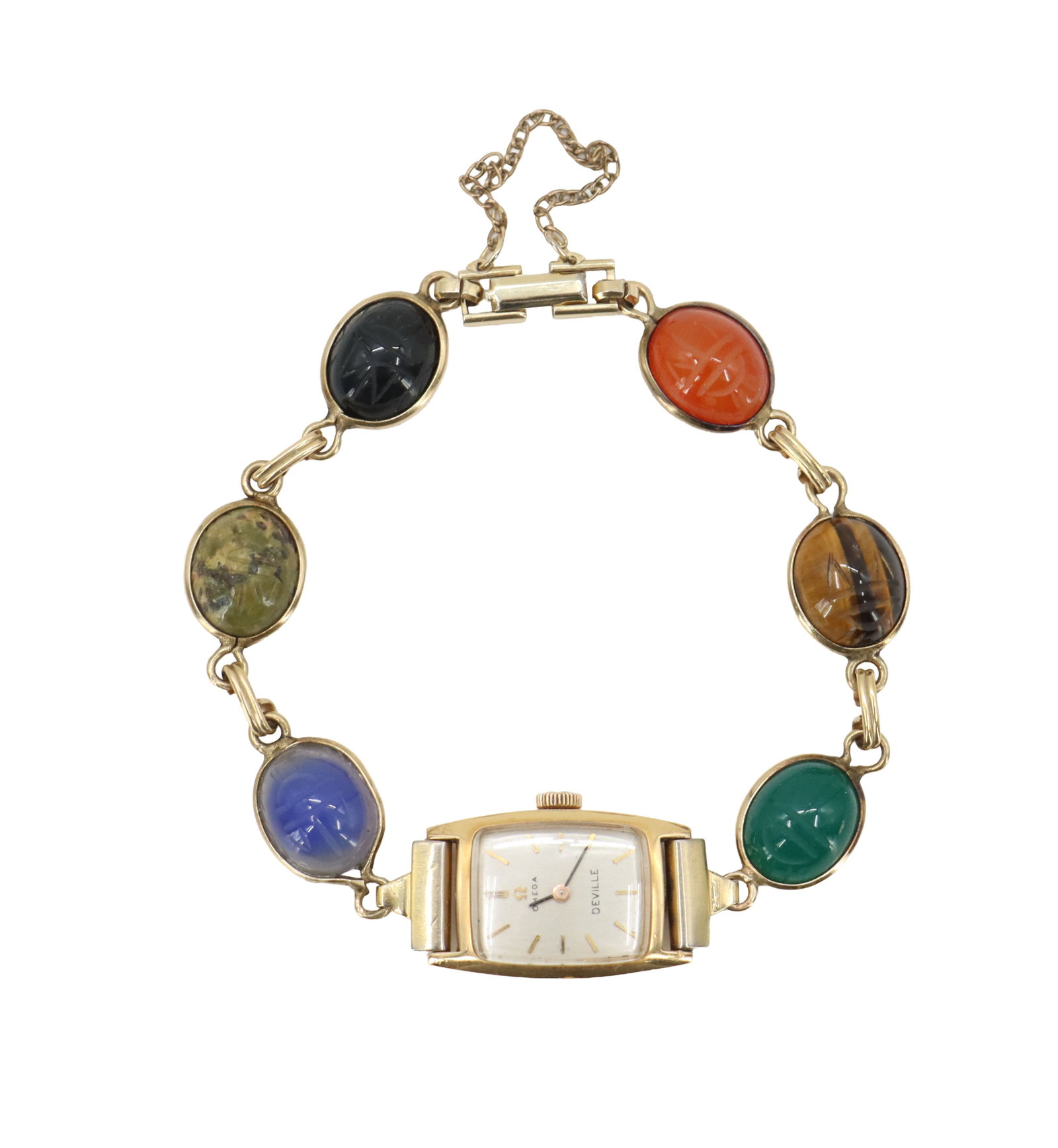 Vintage Gold-Toned Omega De Ville Ladies Wrist Watch With Intergrated Scarab Beetle Bracelet: Vintage Gold-Toned Omega De Ville Ladies Wrist Watch With Intergrated Scarab Beetle Bracelet. The watch face is a sleek, tonneau-shaped dial with gold-tone stick indices, clear branding, and a ma