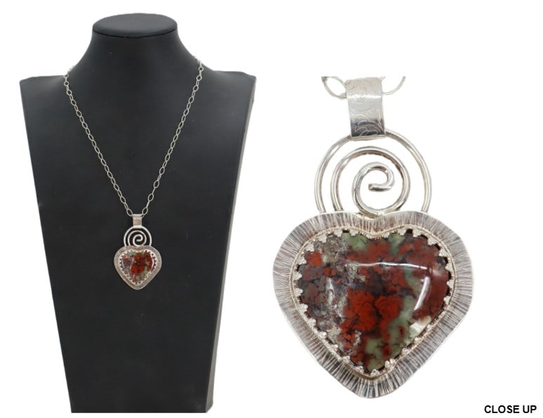 Jenny Bowman Heart Shaped Moss Agate And Sterling Silver Necklace - Gross 0.670 ozt.: Jenny Bowman Heart Shaped Moss Agate And Sterling Silver Necklace. Marked on clasp. Signed on back of pendant. Heart shaped cabochon in a hand sawed "sawtooth" bezel with a flared, textured 