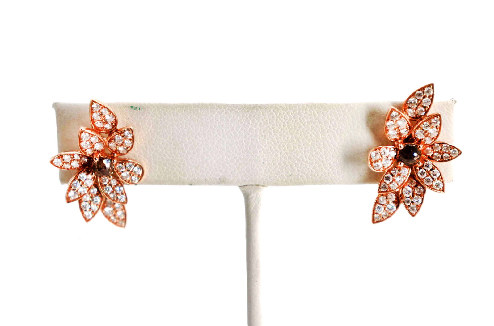 14k Rose Gold and Diamond Earrings - Gross 4.4 g.: 14k Rose Gold and Diamond Earrings - Gross 4.4 g. Elegant 14K rose gold stud earrings with stylized floral spray pavé-set white diamonds and anchored by a prominent cognac diamo