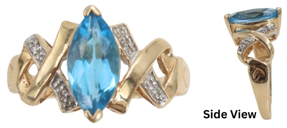 14k Yellow Gold, Blue Topaz, and Diamond Cocktail Ring - Gross 3.9 g.: 14k Yellow Gold, Blue Topaz, and Diamond Cocktail Ring - Gross 3.9 g.. 14K yellow gold cocktail ring with vibrant marquise-cut blue topaz center stone, with openwork shank accented with diag