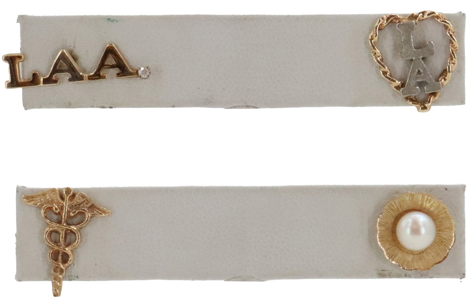 (4) 14k Gold, Diamond, and Pearl Tie Tacks - Gross 2.8 g.: (4) 14k Gold, Diamond, and Pearl Tie Tacks - Gross 2.8 g. Includes a Caduceus, a lily pad with a large pearl in the center, a twisting heart with the letters "LA" inside it, and the letters