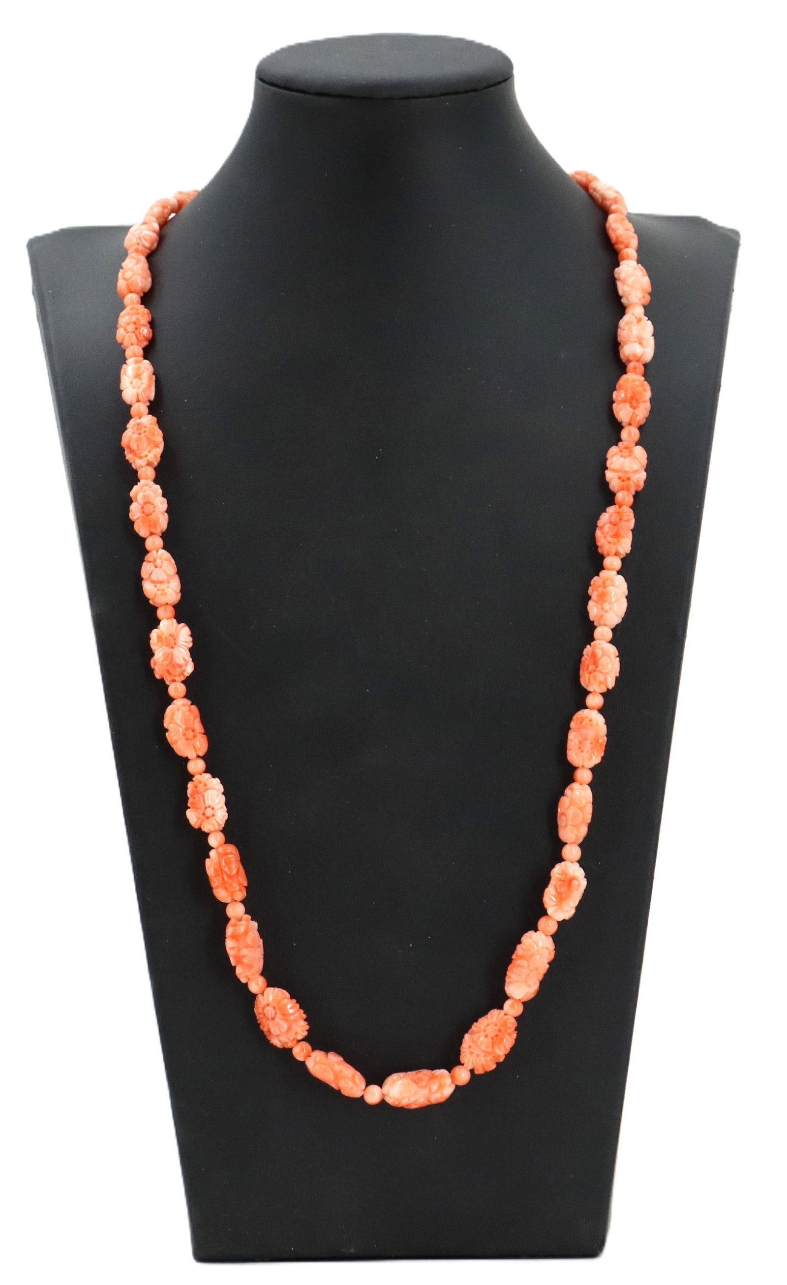 Carved Coral Beaded Necklace With 14k Gold Clasp: Carved Coral Beaded Necklace With 14k Gold Clasp. Carved beads with a floral theme. Marked 14k yellow gold clasp. Size Open: Approx 30 in. Size Closed: 15 1/4 in. 