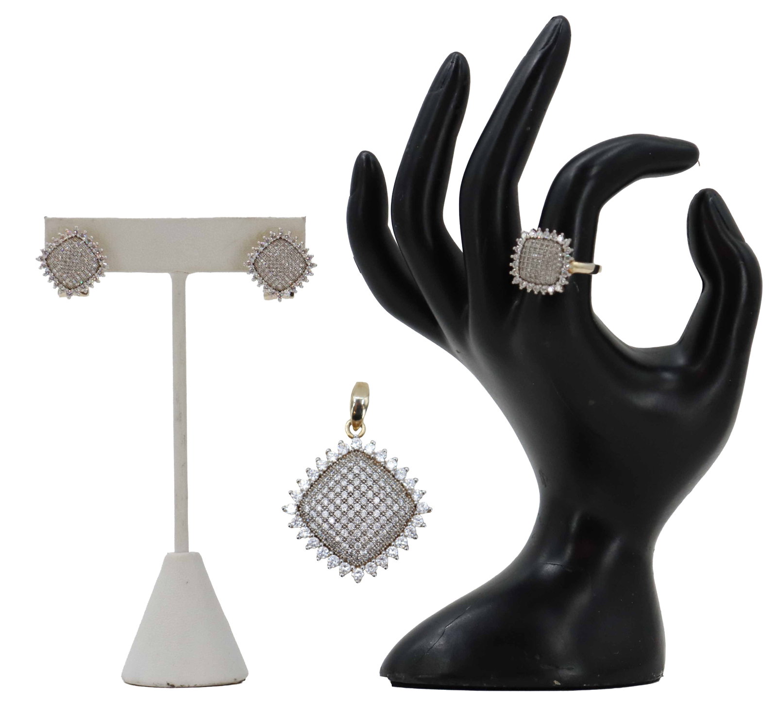 Gold Plated Sterling Silver and Spinel Jewelry Set: Gold Plated Sterling Silver and Spinel Jewelry Set. Gold plated 925 silver and clear spinels. Includes a pair of earrings, a pendant, and a ring. Earrings for pierced ears. Round cut spinels. 