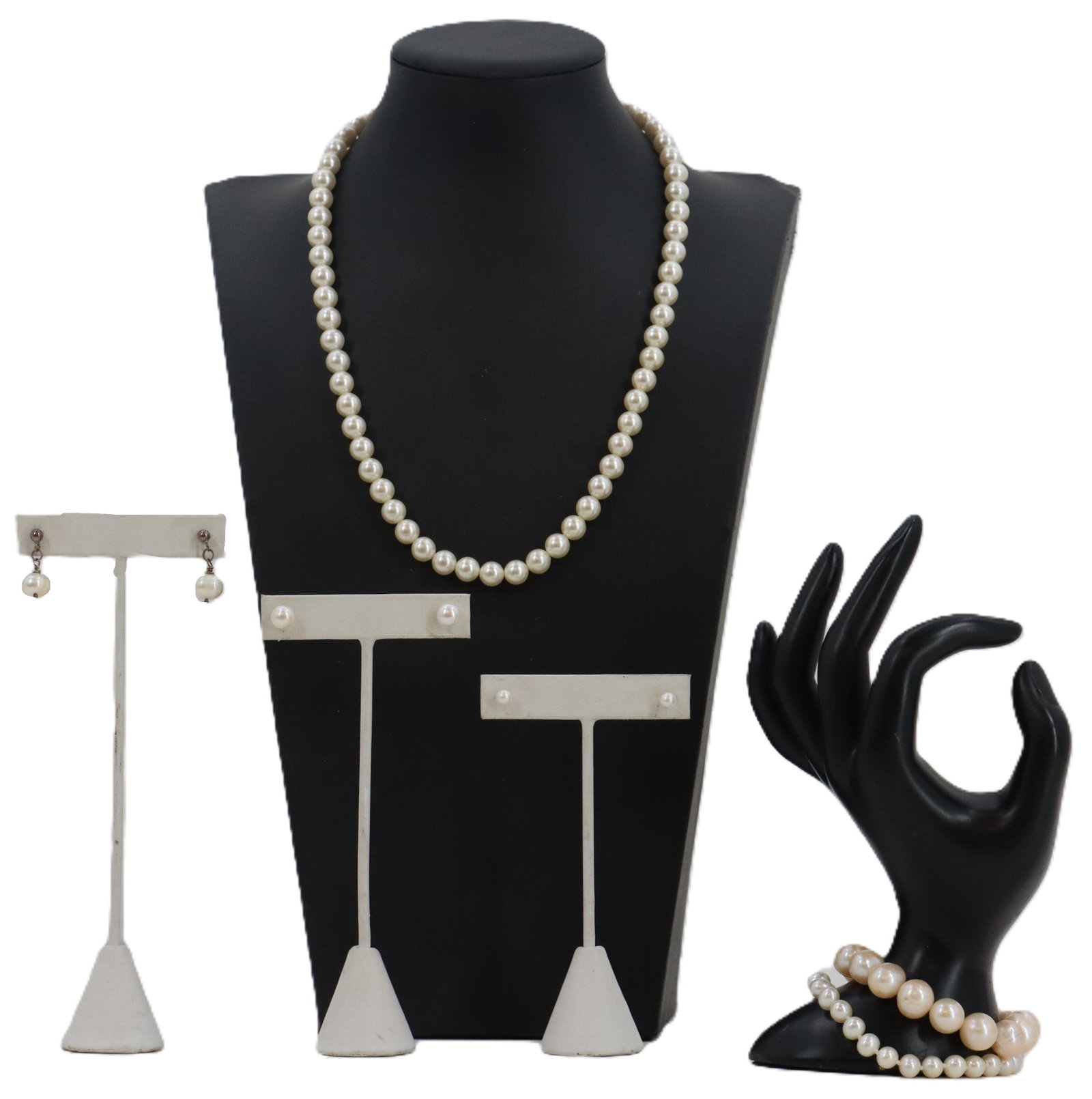 (5) Freshwater Pearl Jewelry - Necklace, Bracelet, Earrings: (5) Freshwater Pearl Jewelry - Necklace, Bracelet, Earrings. Classic freshwater pearl jewelry collection featuring a single-strand necklace, three sets of earrings, and a bracelet displayed on various