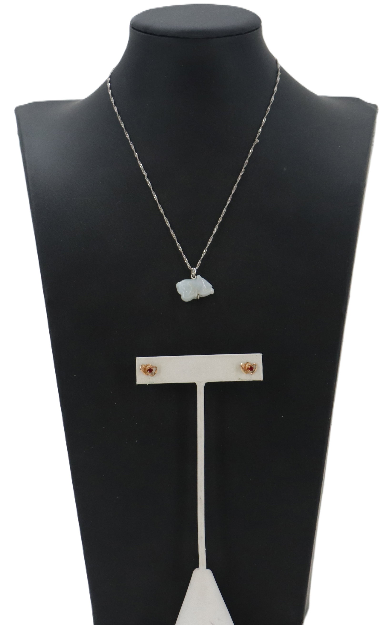 10k Yellow Gold Jewelry - Pair of Earrings and Necklace with Jade Pendant - Gross 2.2 g.: 10k Yellow Gold Jewelry - Pair of Earrings and Necklace with Jade Pendant. Jewelry set comprised of 10k yellow gold necklace with a carved jade pendant and a pair of small 10k yell