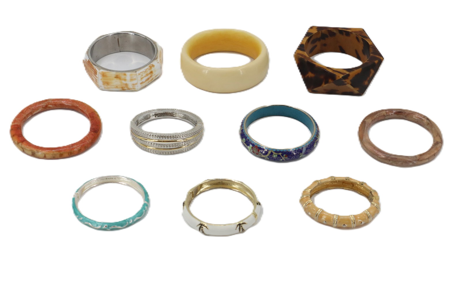(10) Various Costume Jewelry Bangles: (10) Various Costume Jewelry Bangles. In acrylic, metal, and more. One is from Ralph Lauren, and one is cloisonne. About half are slip-on, while the rest open up. Largest Size: 4 x 4 x 1 1/