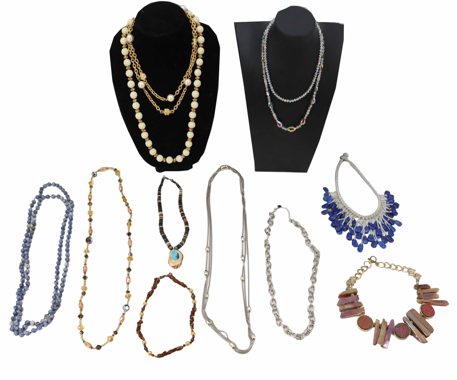 (11) Diverse Costume Necklaces: (11) Diverse Costume Necklaces. Includes a mix of classic beaded strands, chunky statement pieces, and layered metallic chains. The collection features a variety of textures and materials, ranging fro