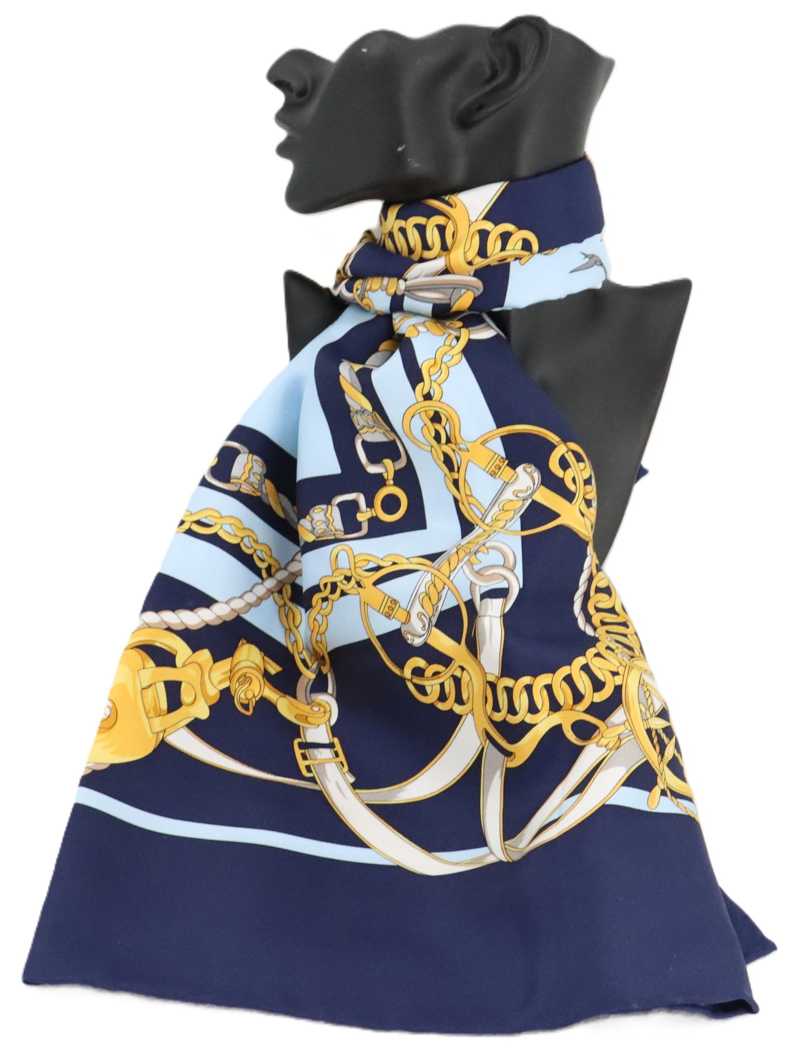J. McLaughlin Nautical Themed Silk Scarf: J. McLaughlin Nautical Themed Silk Scarf. Light blue, gold, and navy blue nautical themed print in a style similar to Hermes, with rolled edges. Condition: Tag missing. Size: 35 x 35 