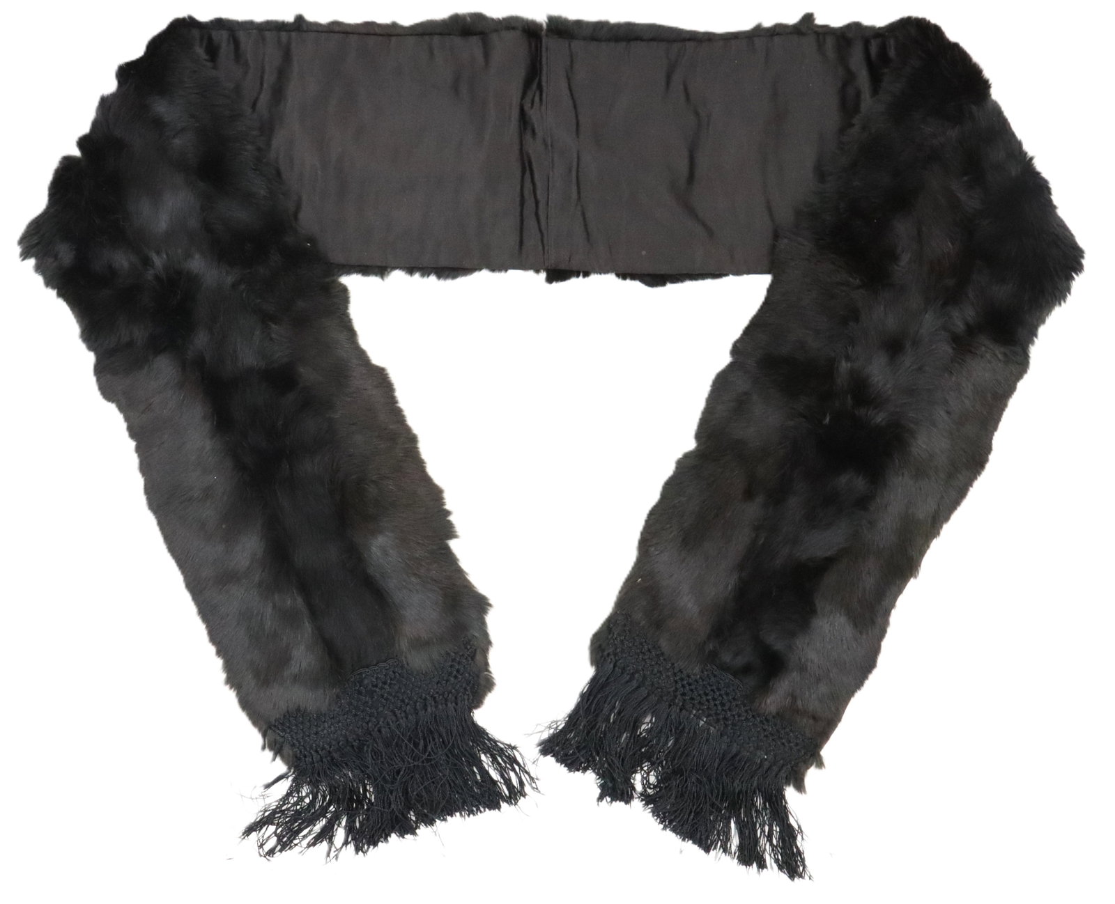 Vintage Black Fur Scarf with Fringe: Vintage Black Fur Scarf with Fringe. Vintage-style black fur scarf featuring a smooth fabric lining at the back and decorative, knotted fringe trim at both ends. Size: 77 x 8 1/4 in. 
