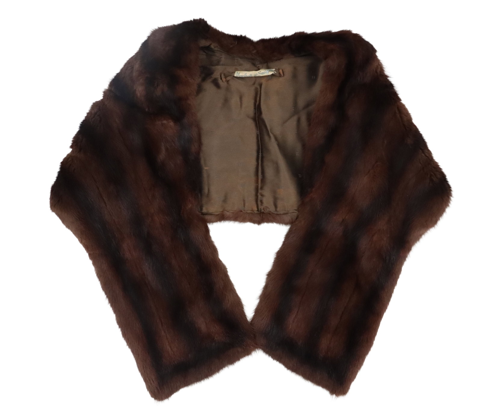 Vintage Marshall & Snelgrove Chestnut Mink Shoulder Shawl: Vintage Marshall & Snelgrove Chestnut Mink Shoulder Shawl featuring a silky interior lining and a brand label at the neck. Size: 57 x 13 x 1 in. Marshall & Snelgrove was a prominen