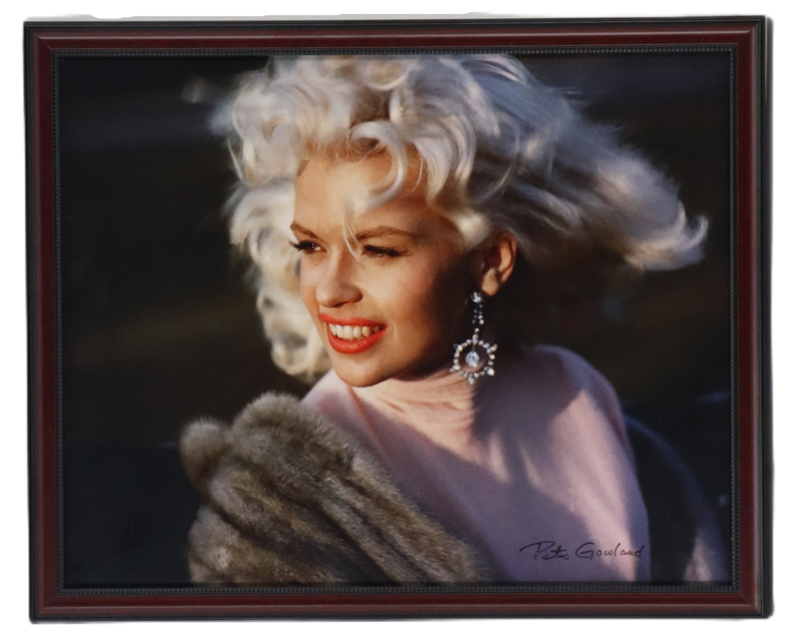 Peter Gowland (1916-2010) American, Color Photo of Jayne Mansfield: Peter Gowland (1916-2010) American, Color Photo of Jayne Mansfield. Color photograph by Peter Gowland capturing Jayne Mansfield with her radiant smile, wearing a fur stole and elegant drop 