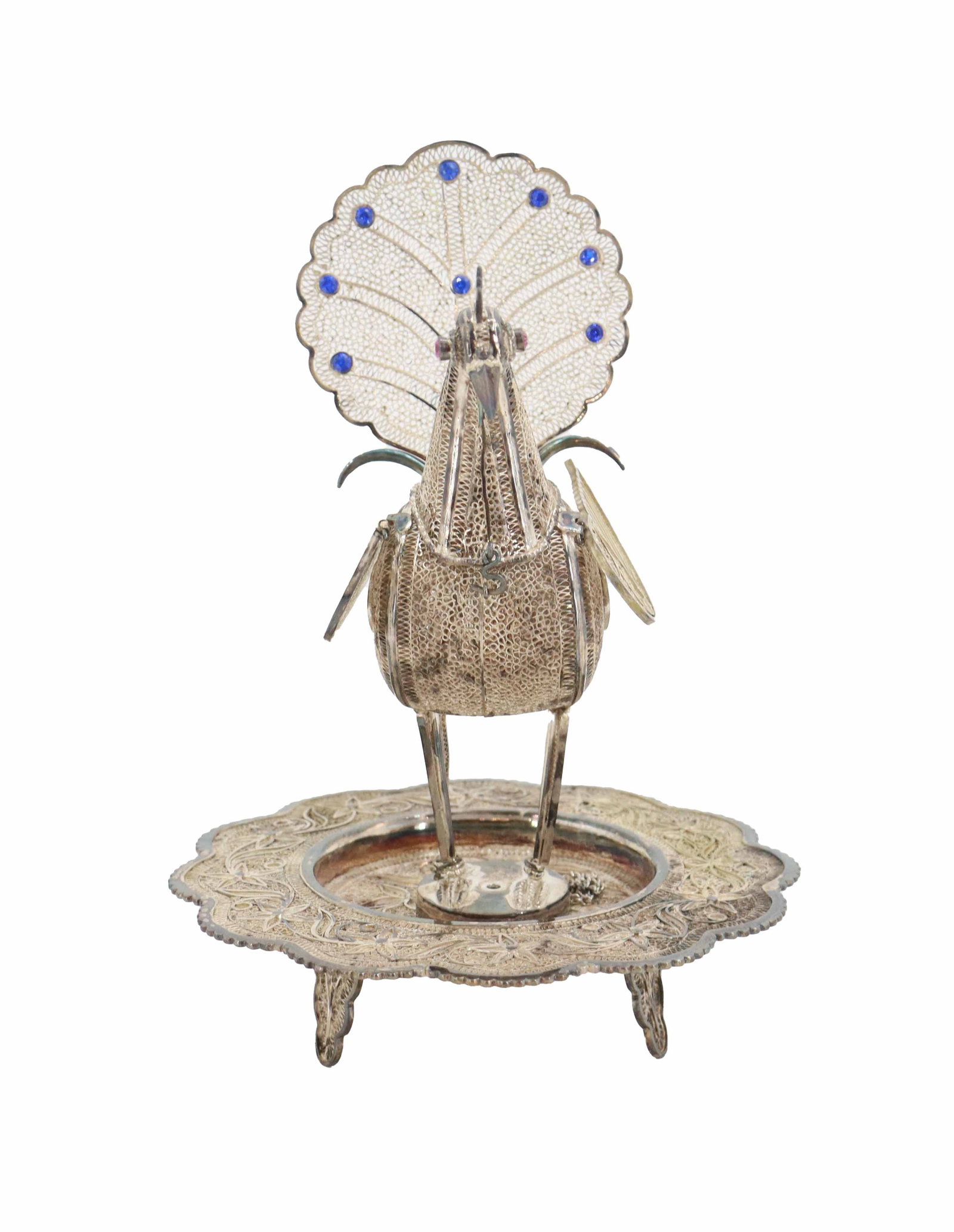 Silver Filigree Peacock Incense Burner: Intricate silver filigree pSilver Filigree Peacock Incense Burner. eacock figurine features a fan-shaped tail accented with blue glass cabochons and stands upon a coordinating footed tray with