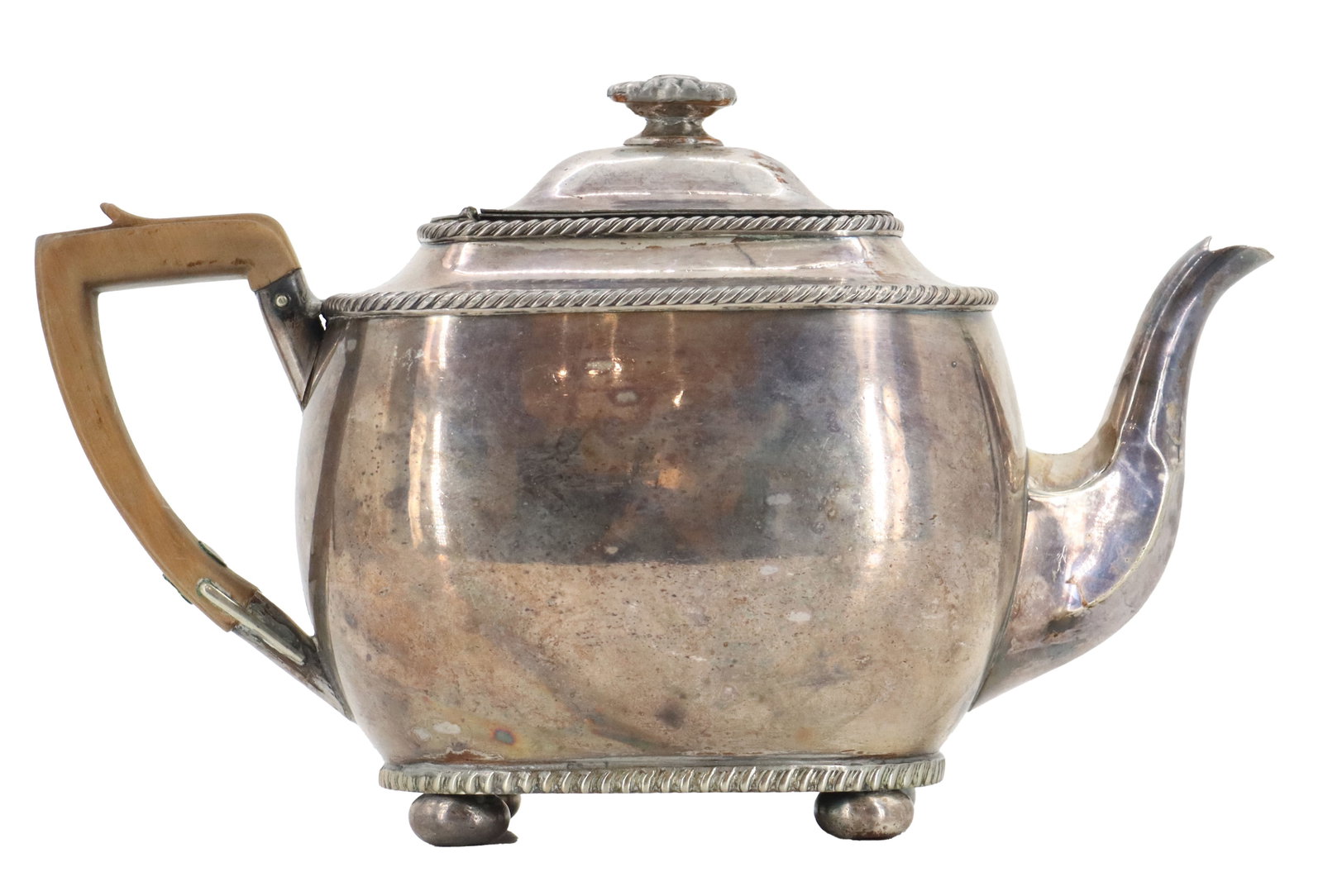 Antique English Silver on Copper Teapot: Antique English Silver on Copper Teapot. Features a classic squat, rounded body resting on ball feet with a distinct gadrooned border along the base, shoulder, and lid rim. It is fitted with an angled