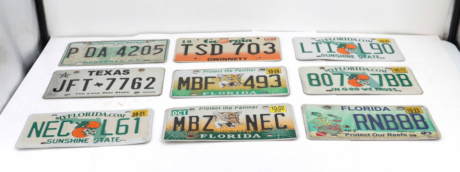 (9) License Plates - 2