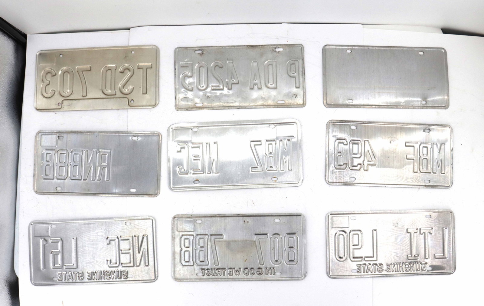 (9) License Plates - 7