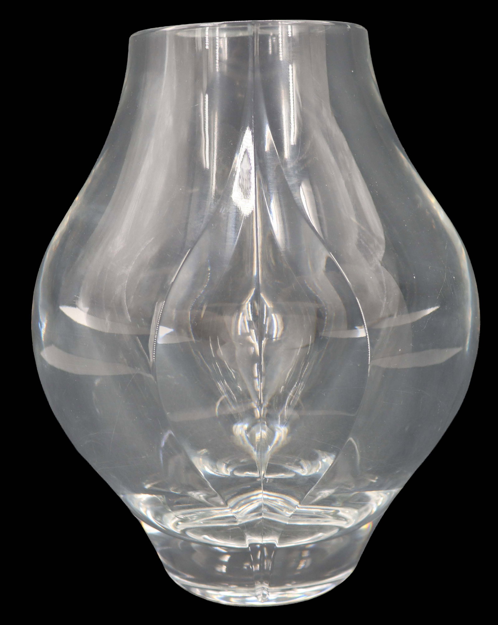 French Saint-Louis "Univers" Crystal Vase: An iconic pattern from the 1970s with a distinctive rounded middle and vertical leaf cuts. Marked on the underside. Size: 6 1/2 x 8 in. The Compagnie des Cristalleries de Saint Louis