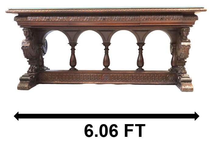 Monumental Italian Renaissance Revival Carved Oak Office Desk with Glass Top: Monumental Italian Renaissance Revival Carved Oak Office Desk with Glass Top. The surface is in excellent condition thanks to the large protective piece of glass over it. Beautiful faces (stylized