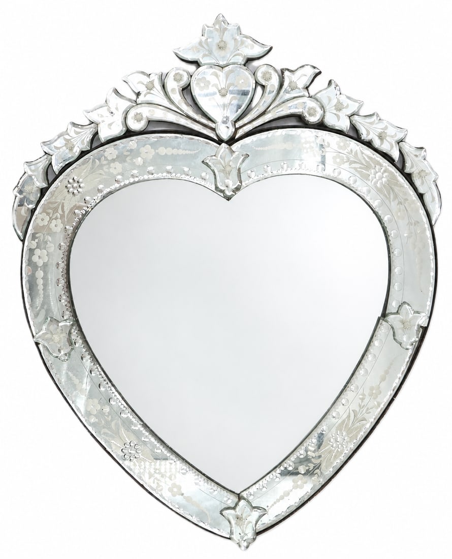Vintage Italian Venetian Glass Heart Shaped Wall Mirror: Vintage Italian Venetian Glass Heart Shaped Wall Mirror. Ornate, heart-shaped wall mirror featuring intricate glass etchings of floral patterns and decorative, multi-piece mirrored borders. Size: 30 x