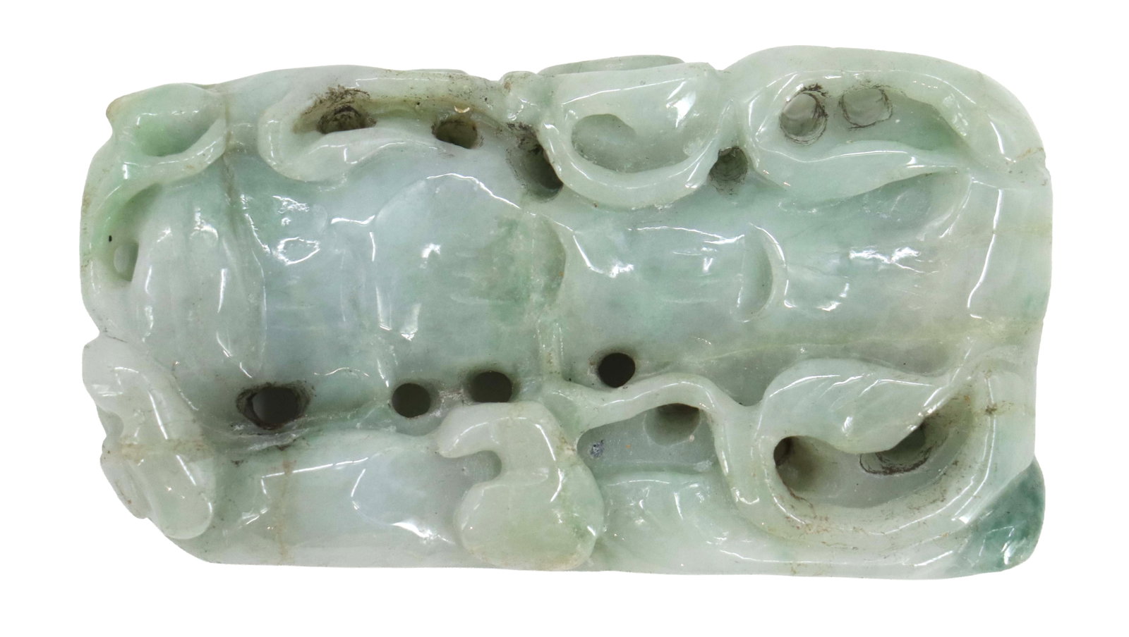 Chinese Carved Green Jade Pendant: Chinese Carved Green Jade Pendant. Pale, celadon-colored jade carving featuring an intricate openwork design of sinuous, dragon-like figures. Size: 1 1/4 x 2 1/2 in. 