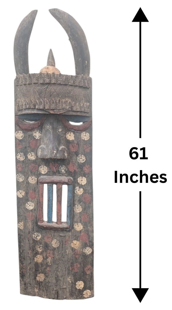 Exceptionally Large African Toma Landai Headdress: Exceptionally Large African Toma Landai Headdress. Tall, hand-carved and decorated, with enormous horns, eyeholes, and a barred mouth. The Landai mask is a central ritual object of the Toma (or Loma) 