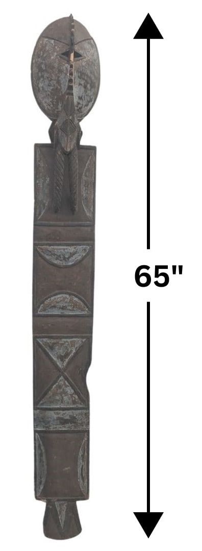African Mossi Carved Wood Plank Mask: African Mossi Carved Wood Plank Mask. Half-moon and triangle shapes make up the decorations of the main body, with a rounded foot and headpiece that has two small holes for the eyes. 