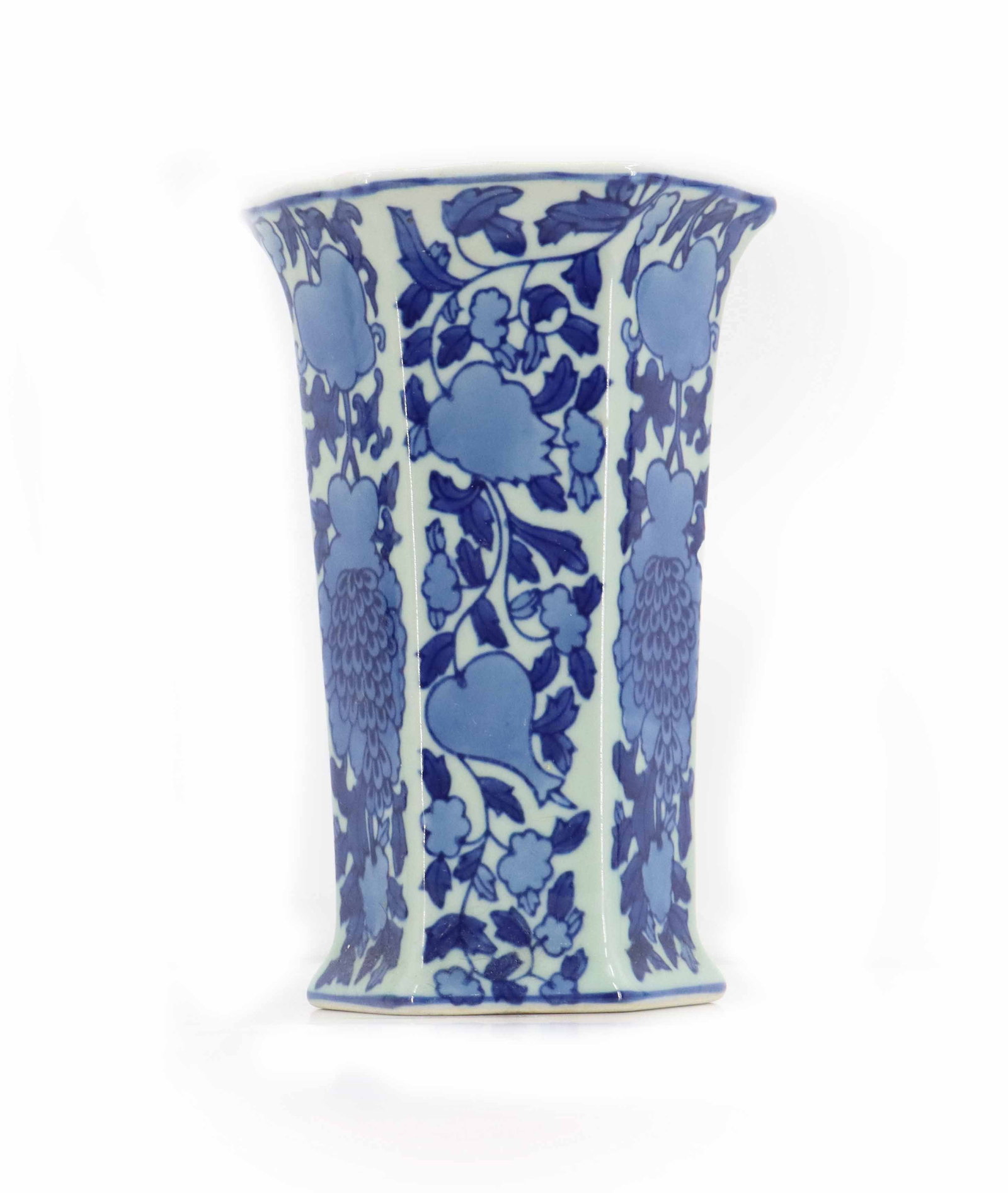 Chinese Blue and White Hexagonal Vase: Chinese Blue and White Hexagonal Vase. Hexagonal blue and white porcelain vase decorated with traditional Asian floral and vine motifs in varying shades of cobalt. Four character mark on base. Si