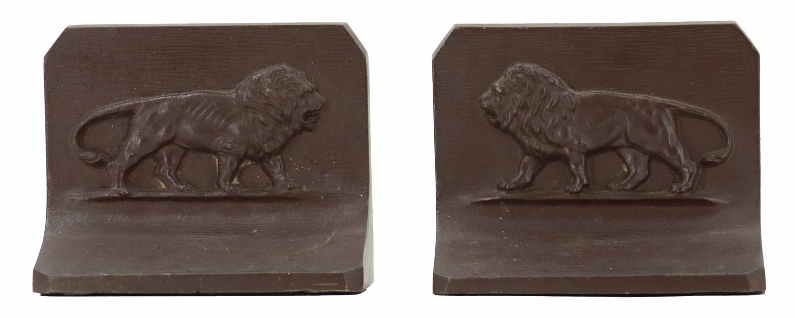 After Antoine-Louis Barye (1795-1875) French, Pair of Cast Iron Lion Bookends: After Antoine-Louis Barye (1795-1875) French, Pair of Cast Iron Lion Bookends. A profile of a lion is mirrored on both pieces, with faded and torn labels on both undersides that read: "BARYE: