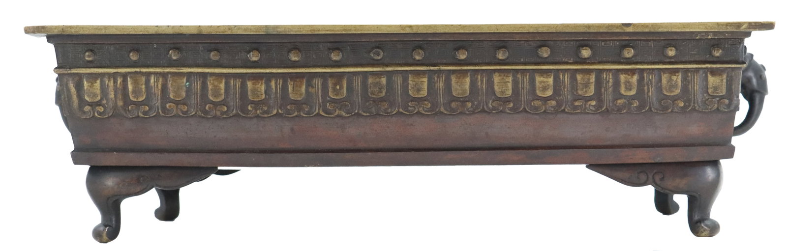 Early 20th Century Chinese Bronze Jardiniere: Early 20th Century Chinese Bronze Jardiniere. Rectangular, footed bronze planter featuring a weathered patina, a studded rim, and an ornate, repeating scrollwork band along the midsection. Size:&
