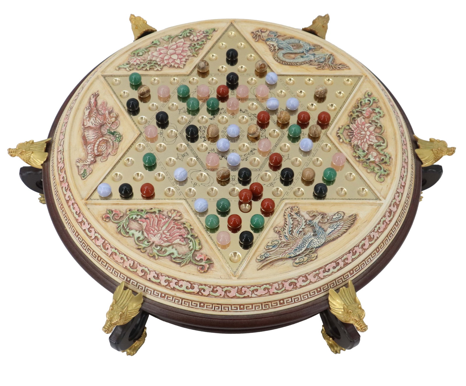 Vintage Franklin Mint Chinese Checkers Set: Vintage Franklin Mint Chinese Checkers Set. Ornate Chinese Checkers set featuring a decorative circular board with intricate carvings, colorful stone marbles, and a dark wood base supported by gold-ac