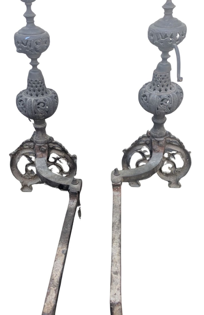 Antique Renaissance Style Open Andirons: Antique Rennaissance Style Open Andirons. Pair of antique metal andirons featuring decorative openwork finials and curved legs designed to support logs within a fireplace. Size: 7 x 50 /2 x 37 1/