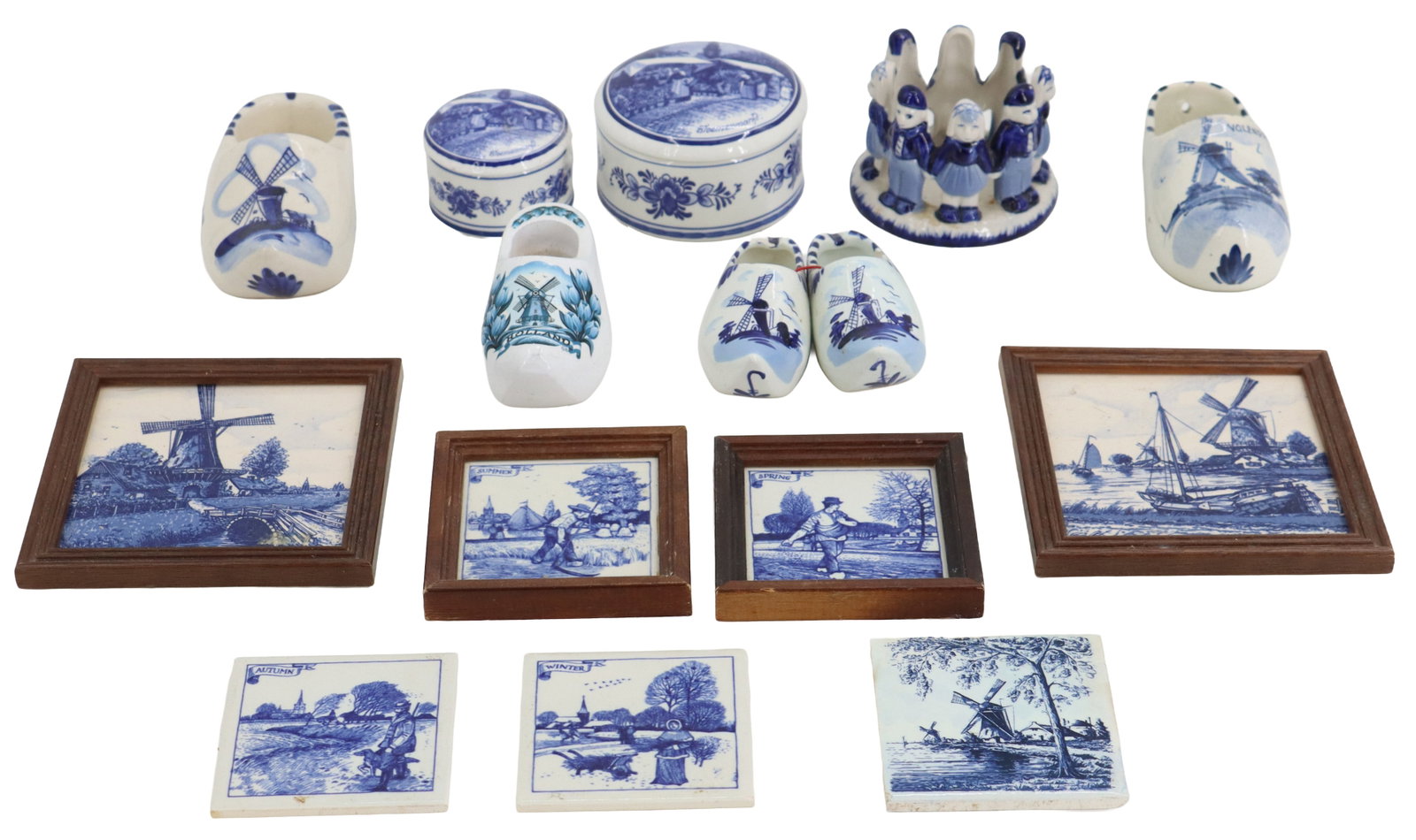 (15) Vintage Delft Porcelain Decorative Objects: (15) Vintage Delft Porcelain Decorative Objects. Includes 2 sets of shoes in matching sizes, 1 left shoe on its own, 4 framed square figural scenes (including ones marked Autumn and Winter) 3 unframed