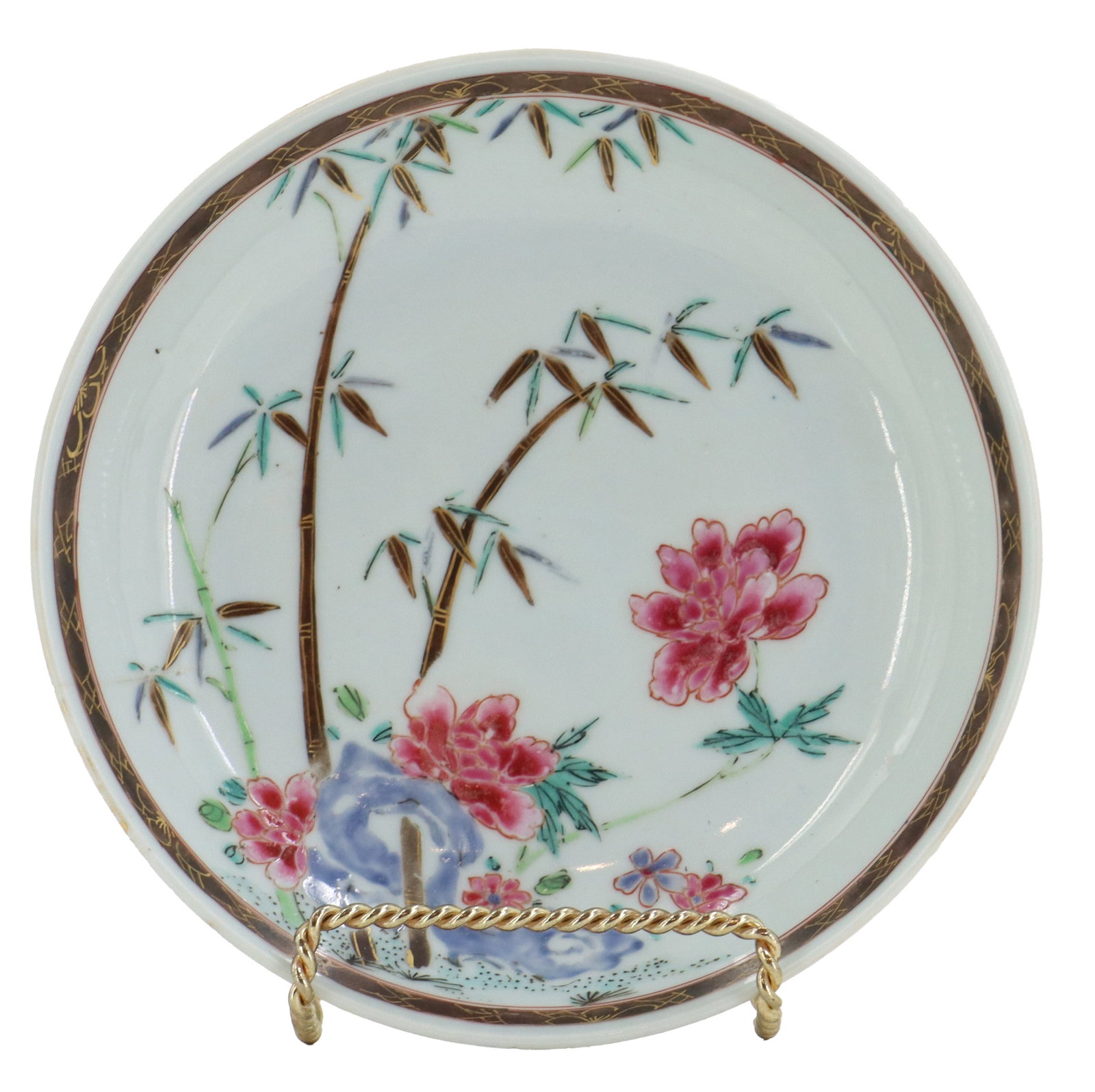 Chinese Qianlong Export Porcelain Hand Painted Sauce Bowl Curated by Elinor Gordon: Chinese Qianlong Export Porcelain Hand Painted Sauce Bowl Curated by Elinor Gordon. Shows a vibrant scene of bamboo and flowers with gold-tinted accents throughout and on the border below the