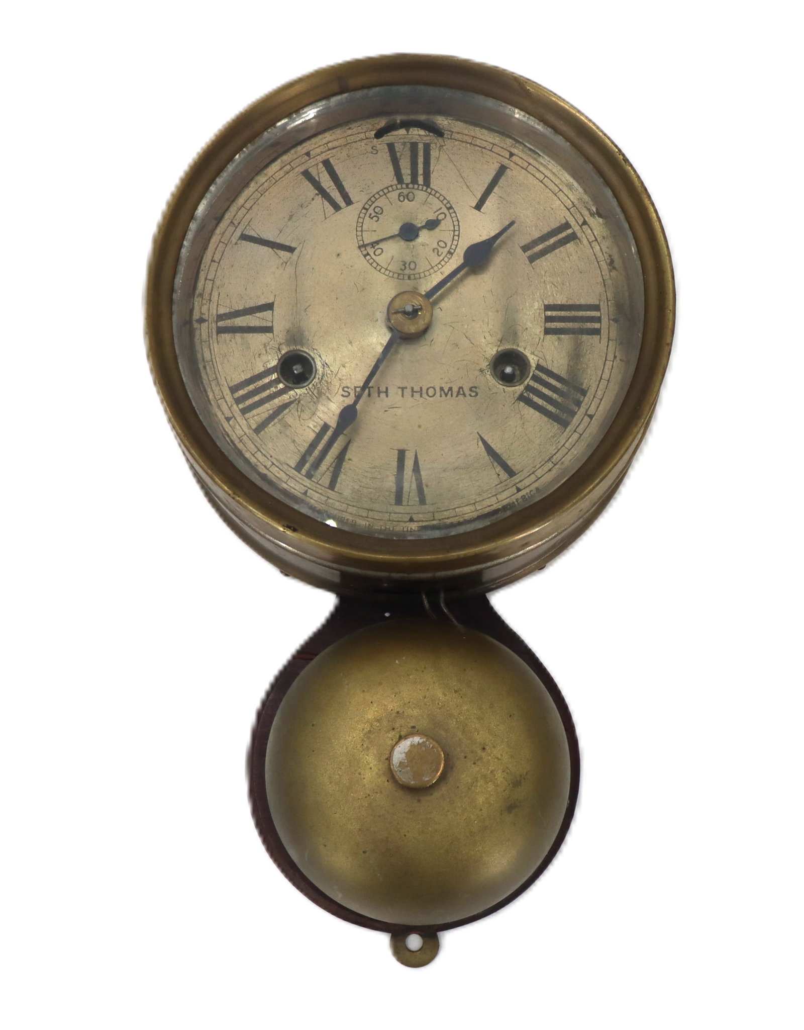 Antique Brass Seth Thomas Ships Clock, "Bell Under": Antique Brass Seth Thomas Ships Clock, "Bell Under". Strikes ships bells silvered dial with Roman numerals. Size: 3 1/4 x 6 1/4 x 11 1/4 in.