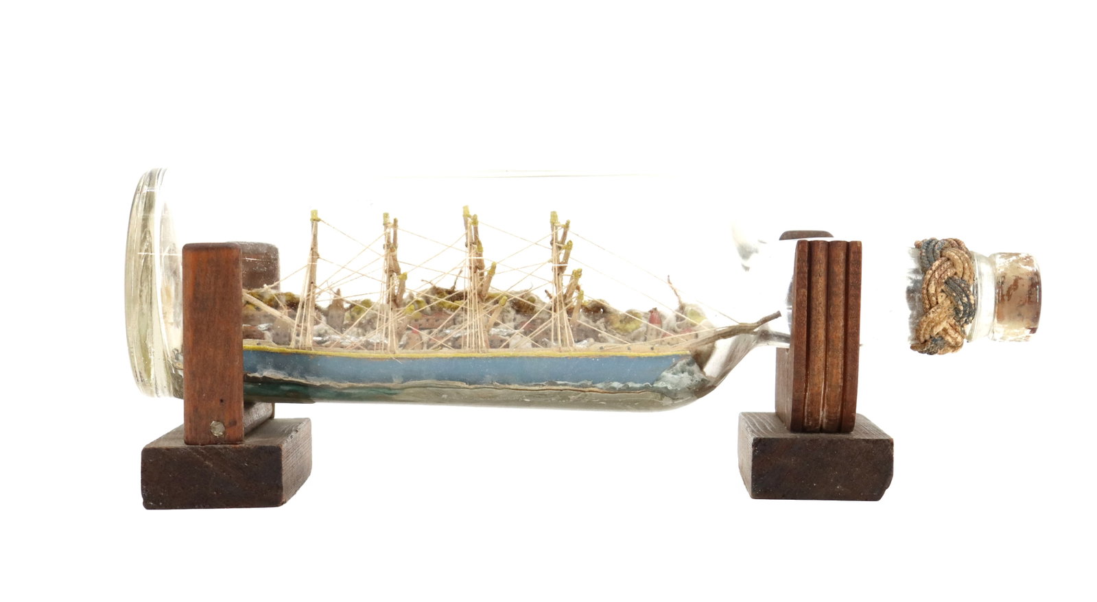 Ship in a Bottle Square Rigged Sailing Ship: Ship in a Bottle Square Rigged Sailing Ship. Size: 4 x 4 1/4 x 11 1/2 in.