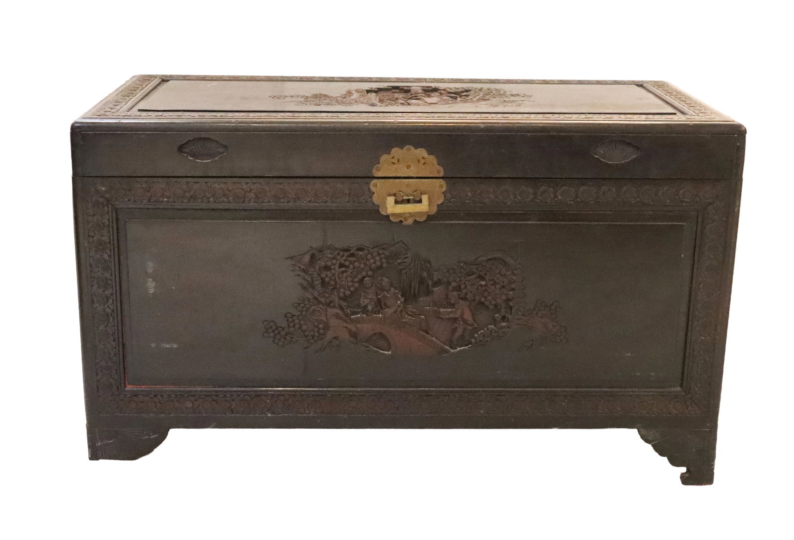 Vintage Chinese Storage Chest with Relief Carved Decoration: Vintage Chinese Storage Chest with Relief Carved Decoration and Circular Brass Escutcheon Plate. Condition: One leg broken. Chest is wobbly. Size: 41 x 20 1/4 x 23 1/2 in. 