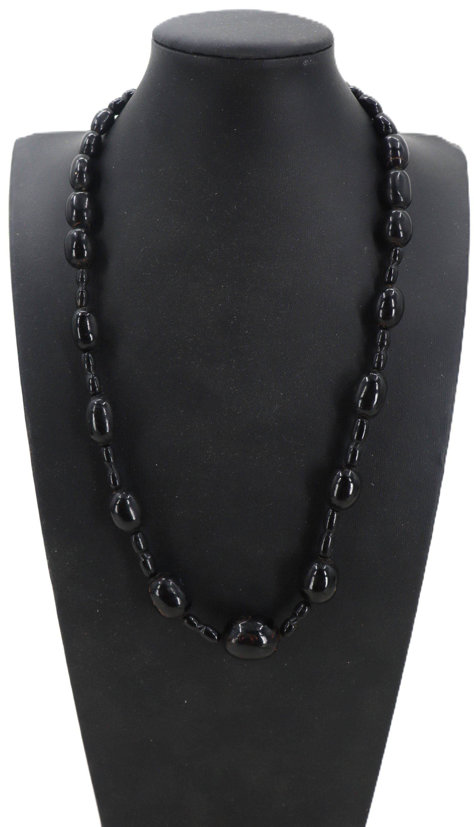 Black Coral Necklace: Black Coral Necklace. Square cut single strand necklace. Length: 22 in. 