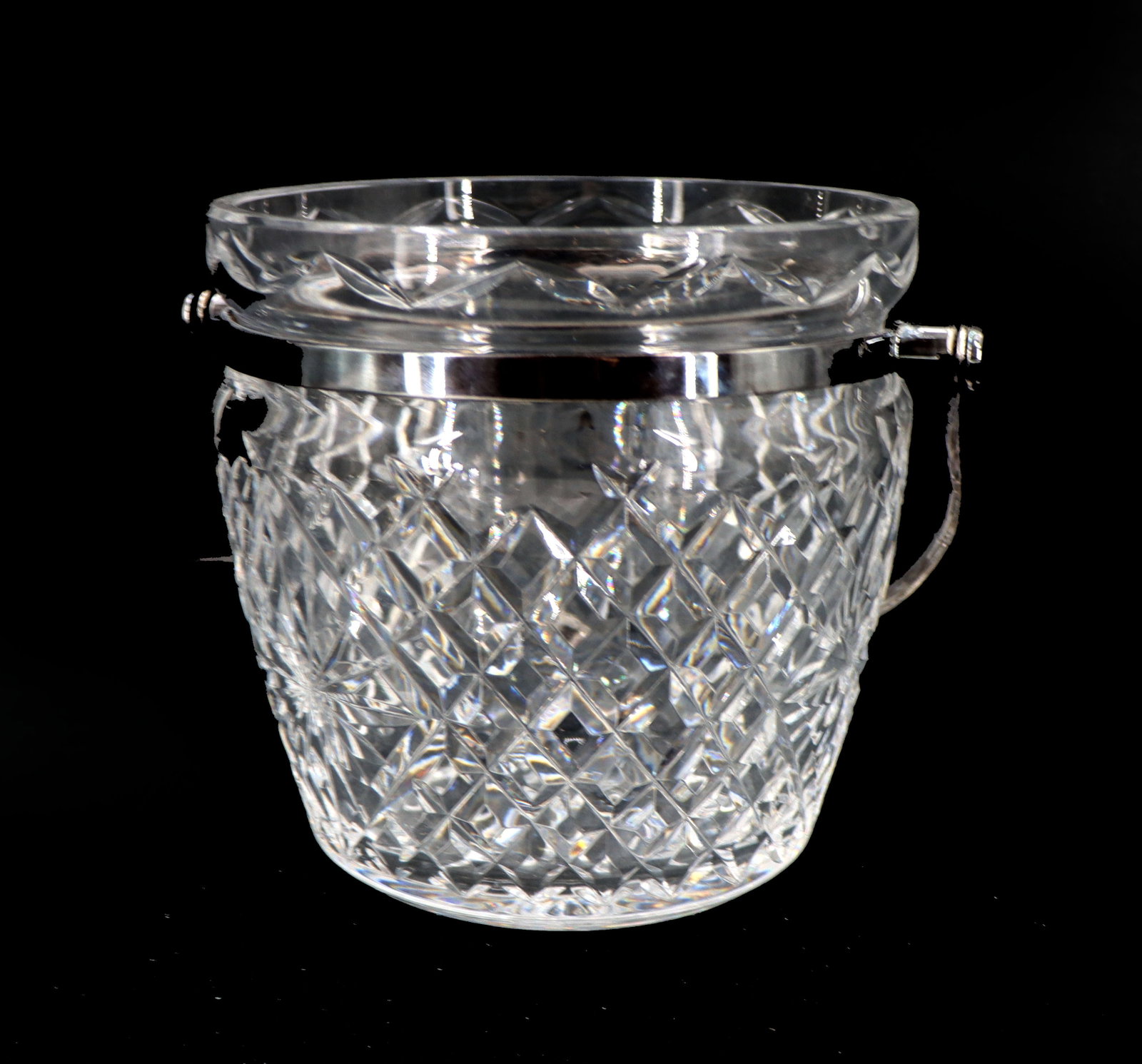 Vintage Waterford Crystal Metal Handle Champagne Ice Bucket: Vintage Waterford Crystal Metal Handle Champagne Ice Bucket. Marked near bottom edge. Size: 6 1/2 x 8 in. Waterford Crystal is a manufacturer of lead glass or “crystal,” especi
