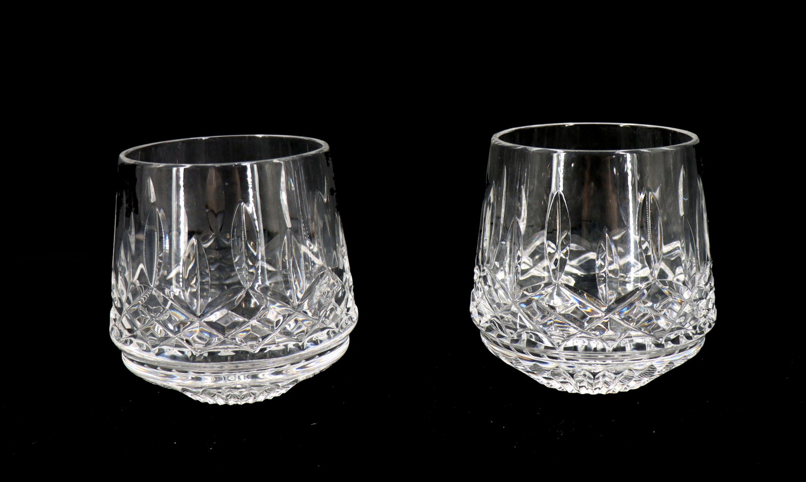 (2) Waterford Crystal Brandy Snifters: (2) Waterford Crystal Brandy Snifters. Marked near bottom edges. Size: 3 1/2 x 3 1/2 in. Waterford Crystal is a manufacturer of lead glass or “crystal,” especially in cut glass