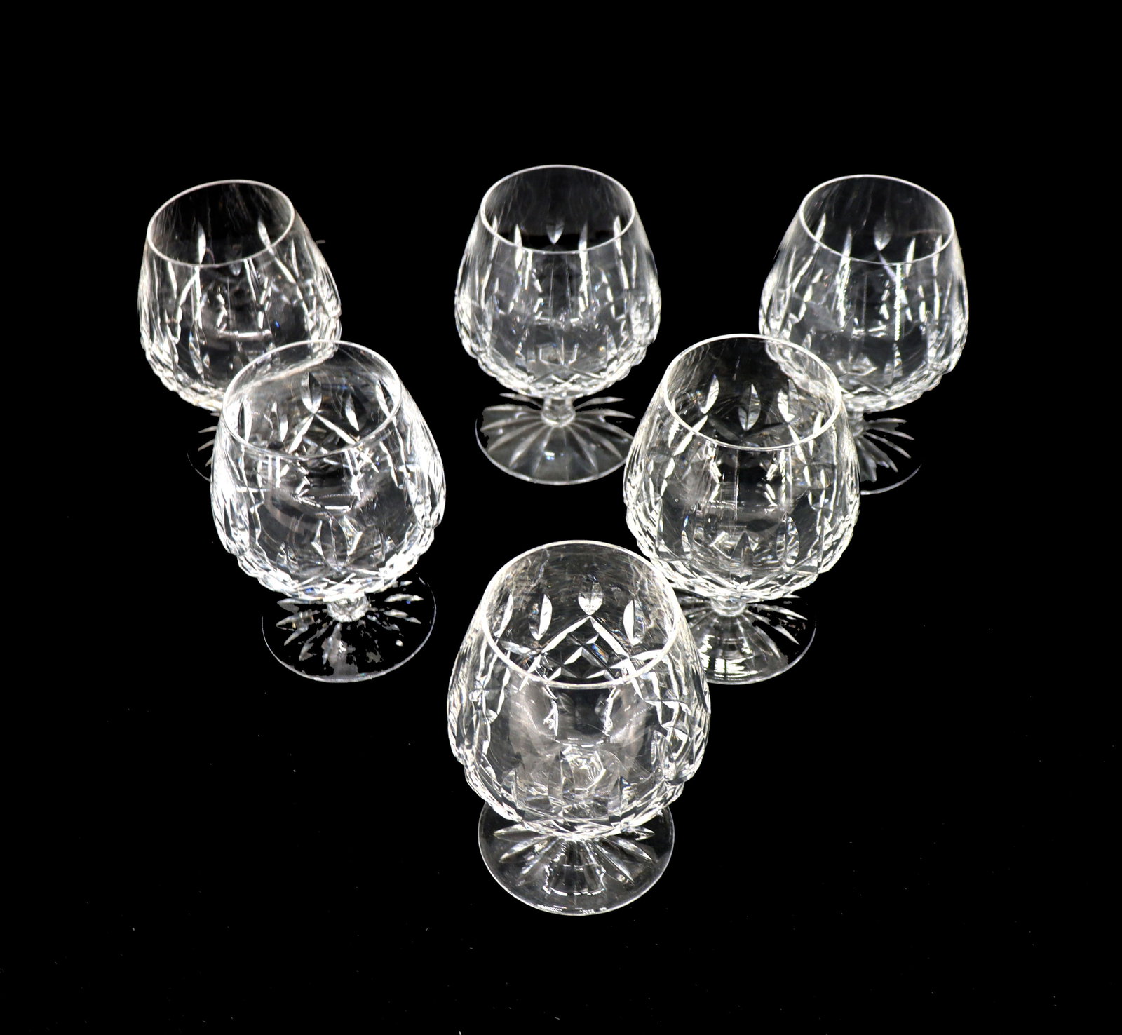 (6) Waterford Crystal Brandy Snifters: (6) Waterford Crystal Brandy Snifters. Marked on undersides. Size: 5 1/2 x 4 in. Waterford Crystal is a manufacturer of lead glass or “crystal,” especially in cut glass, named 