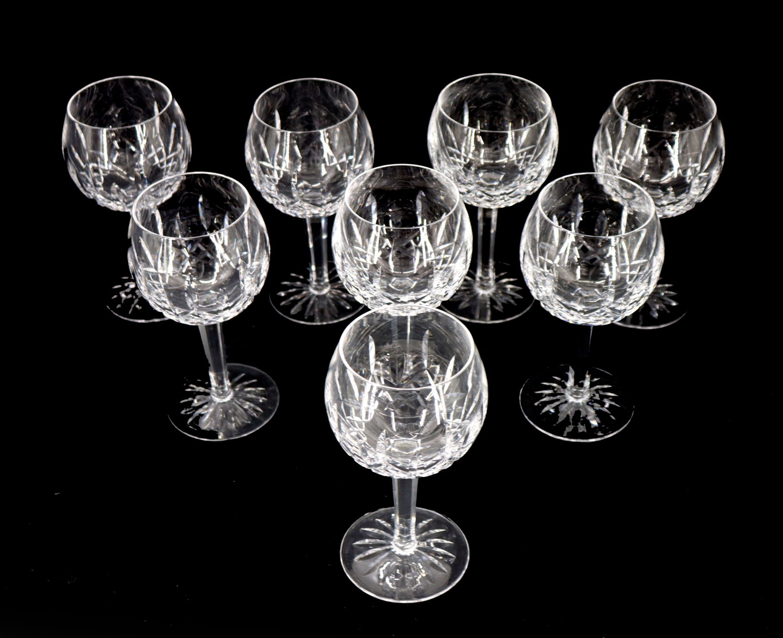 (8) Waterford Crystal Lismore Balloon Wine Goblets: (8) Waterford Crystal Lismore Balloon Wine Goblets. Marked on undersides. Size: 8 x 4 in. Waterford Crystal is a manufacturer of lead glass or “crystal,” especially in cut glas