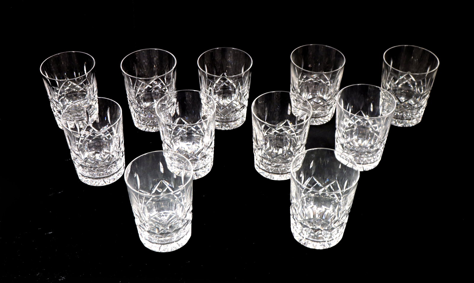 (11) Waterford Crystal Double Old Fashioned Glasses: (11) Waterford Crystal Double Old Fashioned Glasses. Marked near bottom edges. Condition: Small chip on bottom edge of one glass. Size: 4 1/2 x 3 1/2 in. Waterford Crystal is a