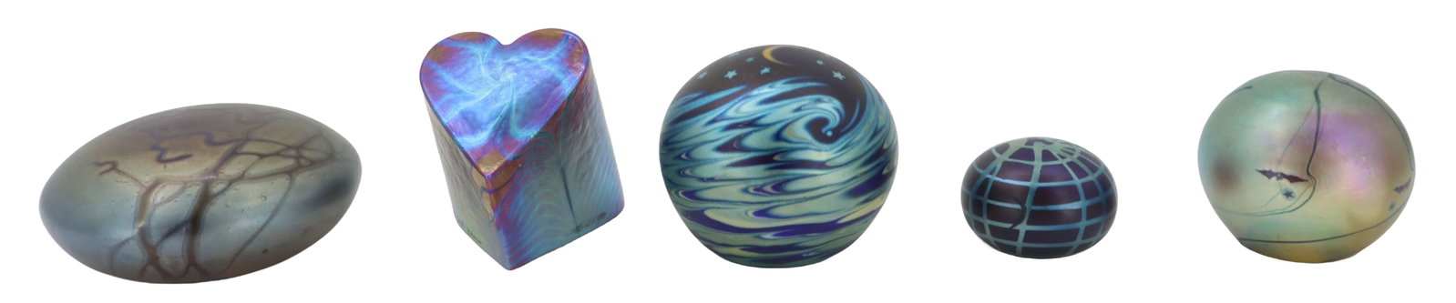 (5) Iridescent Art Glass Desk Accessories: (5) Iridescent Art Glass Desk Accessories. Five-piece collection of iridescent art glass paperweights in various shapes—including an oval, a heart, a patterned sphere with a crescent moon, a
